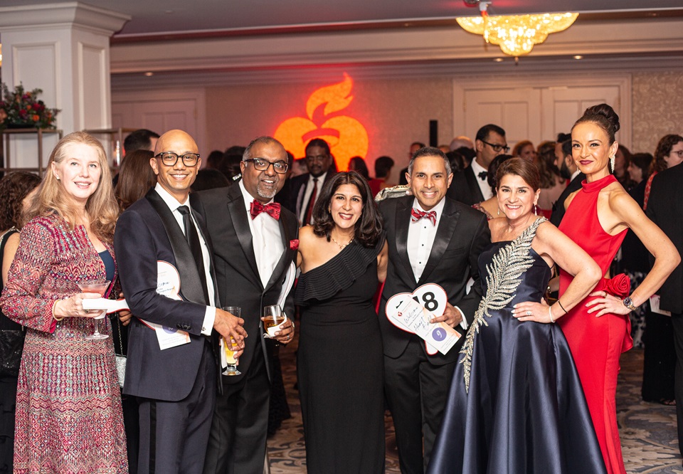 Group of attendees in formal wear